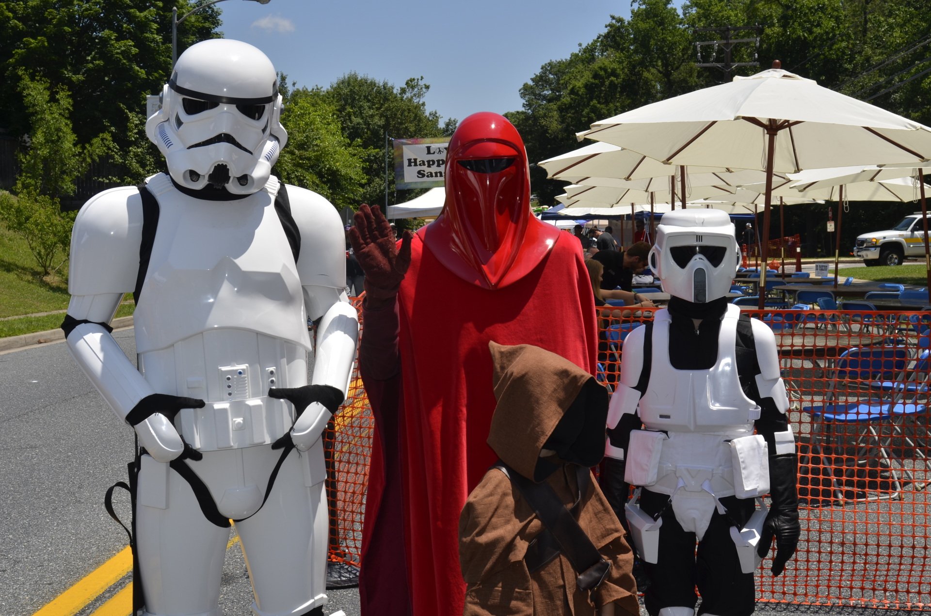 Four People dressed in Star Wars Costumes